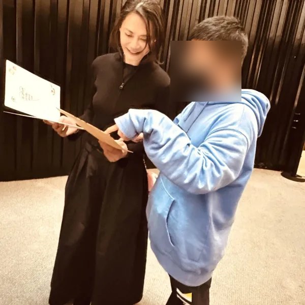 Sophia Huang with a young participant at an IPAC event